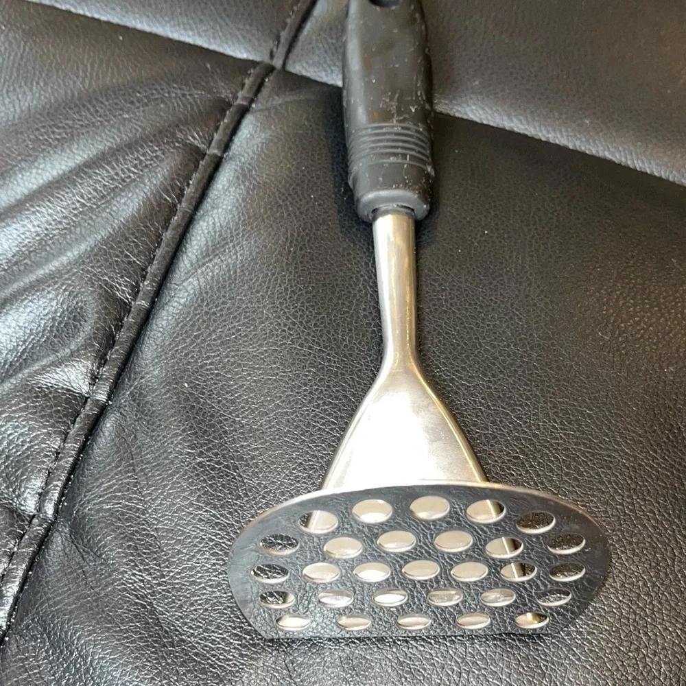 Stainless steel curved potato masher